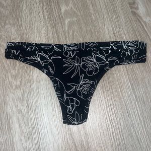 Black with white floral pattern thong